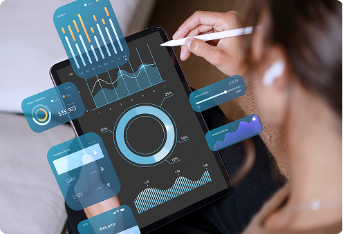 Person using a tablet with interactive data dashboards and charts, symbolizing data-driven insights and analytics.